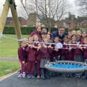 Horsham MP Sir Jeremy Quin cut the ribbon to mark the opening of new play equipment at St John's Primary School in Horsham