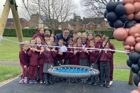 Horsham MP Sir Jeremy Quin cut the ribbon to mark the opening of new play equipment at St John's Primary School in Horsham