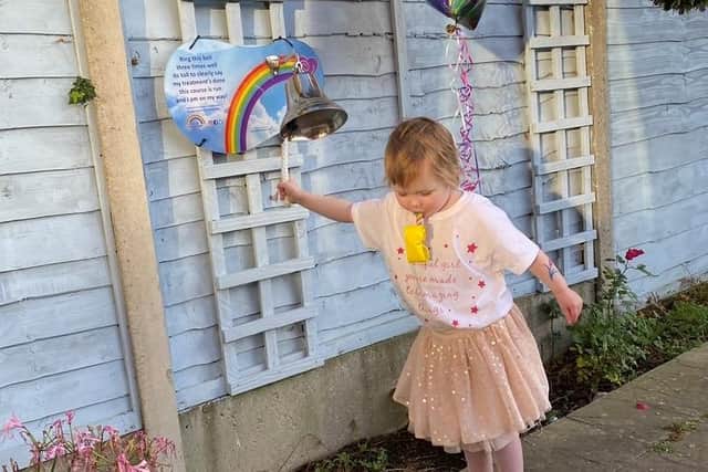 Last year, Evie celebrated her third birthday by ringing a hospital bell to mark the end of her treatment for neuroblastoma.