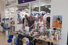 Jenny Jackson, deputy director of fundraising at DEBRA UK, left, with shop manager Louise Cable and volunteers in the Guildbourne Centre