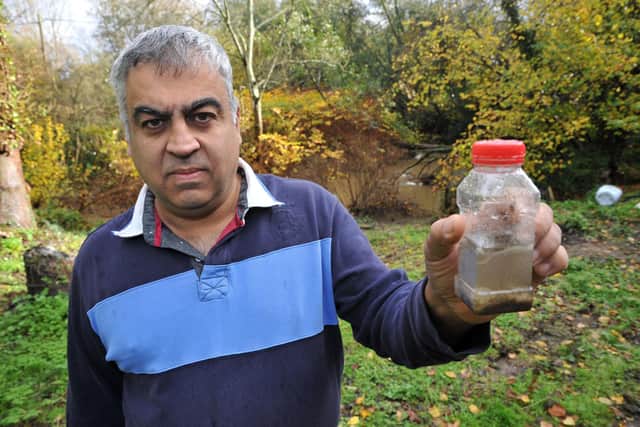 Karl Thacker has had sewage pouring into his garden at Selham nr Midhurst. Pic S Robards SR2211162