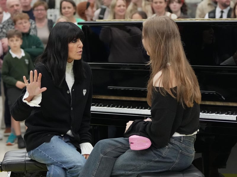 Claudia Winkleman has been pictured at Brighton railway station as her search continues to find more of the UK's most exciting amateur pianists.