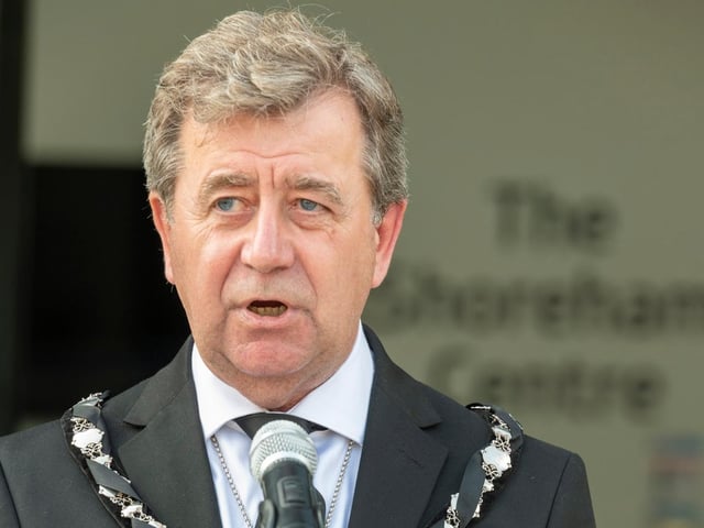 Adur District Council chairman, Andy McGregor, read the proclamation to a crowd outside the Shoreham Centre at 3.30pm. Photo: Adur & Worthing Councils