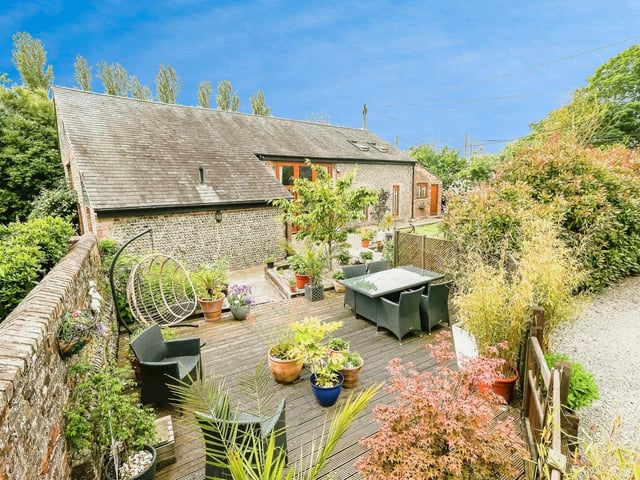 The decking area in the home's secluded garden