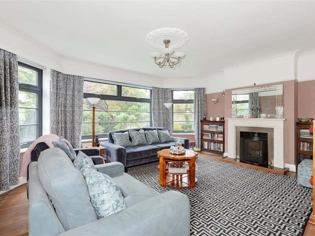 The generous-size living room has a fireplace