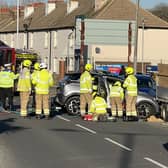 Sompting Road in Broadwater was closed after a two-vehicle collision, which left one person trapped, shortly after midday.