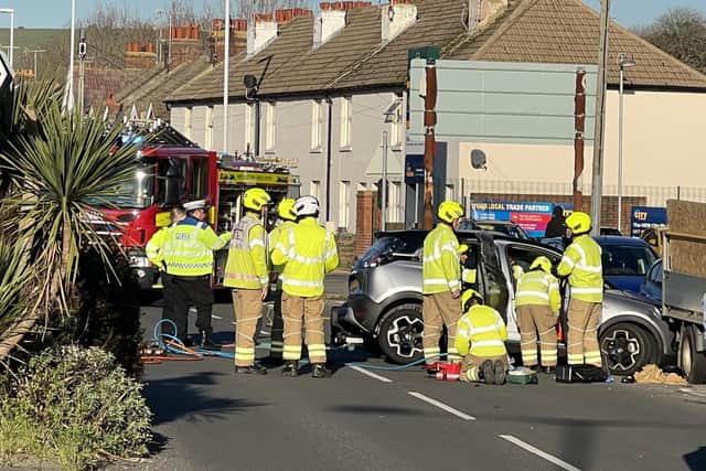 Sompting Road in Broadwater was closed after a two-vehicle collision, which left one person trapped, shortly after midday.