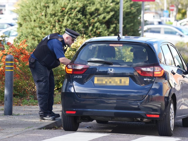 Police officers on hunt for man with suspected firearm