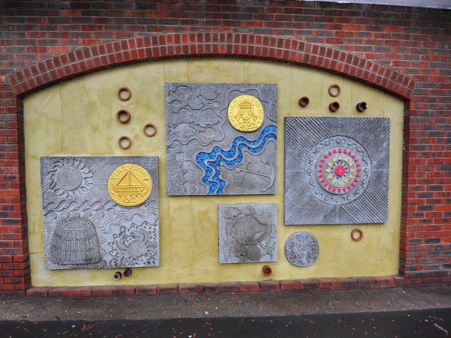 Restoration of the Sainsbury's Concrete Mural by Bexhill Heritage.