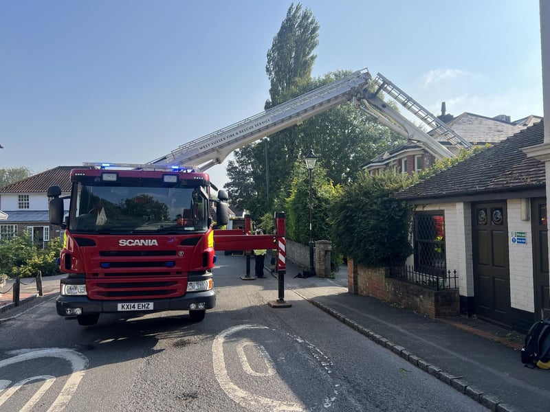 Multiple emergency service crews responded to a 'report that a person had collapsed on a roof' in The Street in Bramber