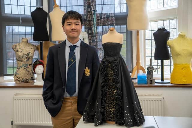 Eastbourne College pupil Isaac Lee with his winning design 