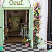 A popular Hove brunch café has unveiled a new look inspired by a Parisian orangery. Photo: Oeuf
