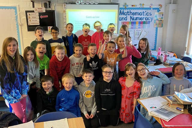 Pupils in P5s look delighted to ditch their uniforms for this worthy cause