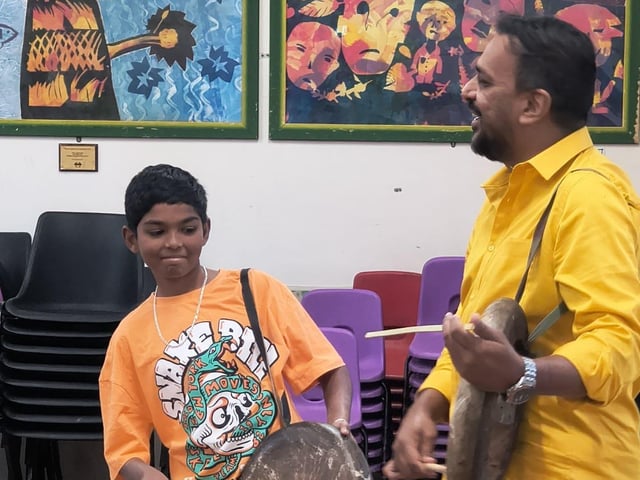 Children and adults came together in Crawley to discover the powerful rhythms of Parai, a traditional Tamil drumming art form, at a community workshop organised by Aurvi Collective