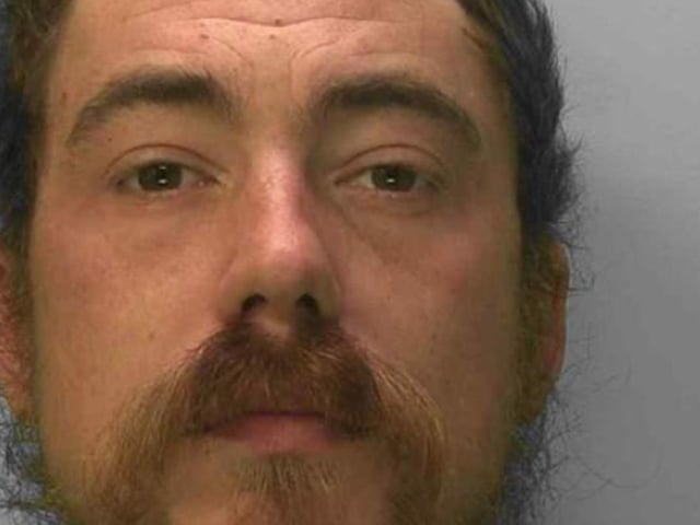 Shocking footage shows the moment when a drink-driver drove the wrong way on the A27 before colliding into several vehicles. Marcus Cresswell attended a premises in Lancing and consumed alcohol before getting behind the wheel. CCTV footage showed the now 36-year-old reversing into other cars in the car park before he drove the wrong way onto the A27. He narrowly avoided a head-on collision with another motorist. Cresswell then drove through two lanes of traffic on the dual carriageway, colliding with vehicles on each side. His appalling driving has been described as “dangerous and selfish” by officers, and caused the A27 to be closed for several hours. At Cambridge Crown Court on May 20, Cresswell admitted charges of dangerous driving, failing to provide a specimen of breath for analysis, driving otherwise than in accordance with a licence, criminal damage to a police cell, and driving without valid insurance. He was sentenced to one year in prison and was disqualified from driving for five-and-a-half years. The court was told how Cresswell, formerly of West Street, Brighton, had been seen drinking alcohol before the incident on October 1, 2021. He had attended a premises at about 3pm, and left after 6pm. Footage showed him colliding with vehicles in the car park before turning the wrong way into oncoming traffic on the A27. He veered back onto the correct side of the dual carriageway, then tried to filter down the centre of two lanes on the A27. Cresswell caused damage to at least 11 other vehicles. The collisions caused extensive damage to his van, causing the wheels to fall off. He then ran from the scene and was detained by members of the public in a field nearby. When officers arrived, Cresswell claimed he had not been the driver and was in fact just in the field randomly to smoke a joint of cannabis. The key to the van was found on his possession, and witnesses told police he was the driver. A can of beer was also found in the driver’s side of the van. In custody, Cresswell failed to provide a