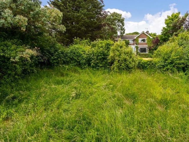 This substantial detached family house sits on the highest point in North Lancing, with grounds totalling 0.5 acres of land. Offers in the region of £1million are invited for this four-bedroom property at the foot of the South Downs National Park, with magnificent panoramic coastal views.