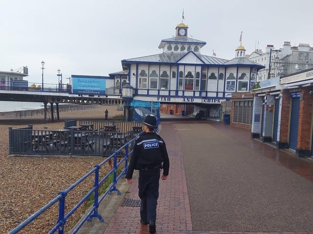 An officer on patrol along Eastbourne seafront.