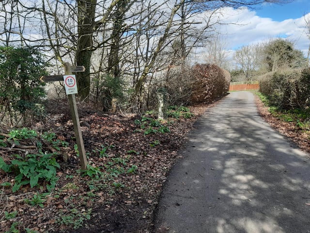 At the end is a short walk up another piece of road