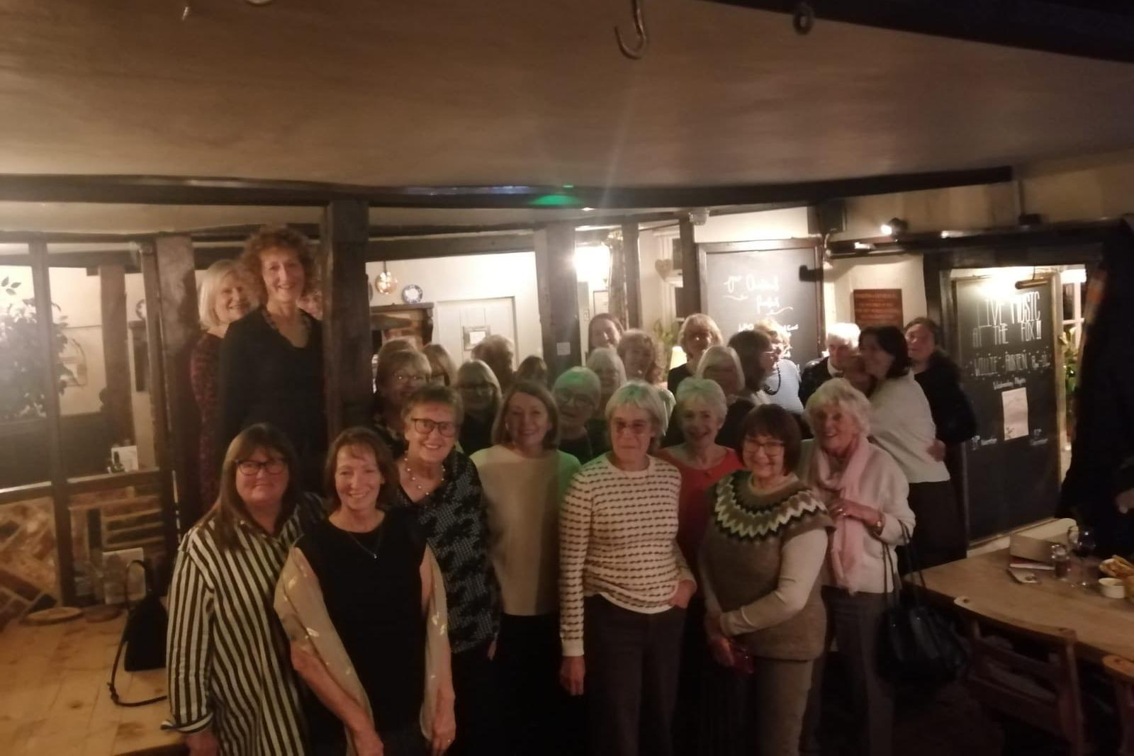 Singleton and East Dean WI celebrating the 110th anniversary at the pub where it all started, now called The Fox Goes Free, in Charlton, on November 20