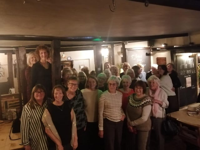Singleton and East Dean WI celebrating the 110th anniversary at the pub where it all started, now called The Fox Goes Free, in Charlton, on November 20