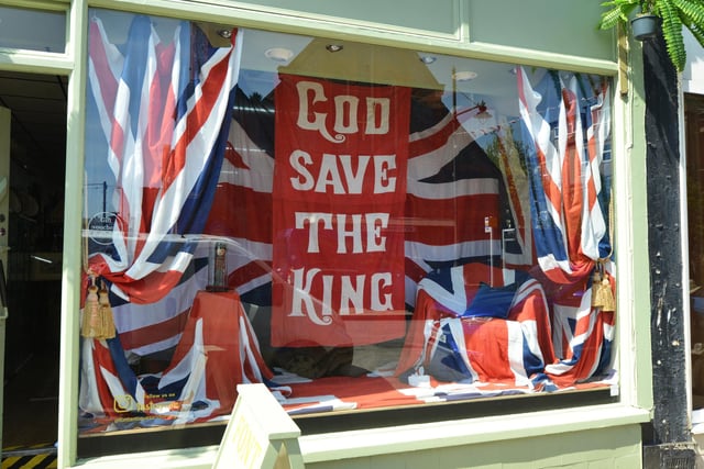 Bexhill businesses getting ready for the Coronation weekend. Font - Antiques and Vintage.
