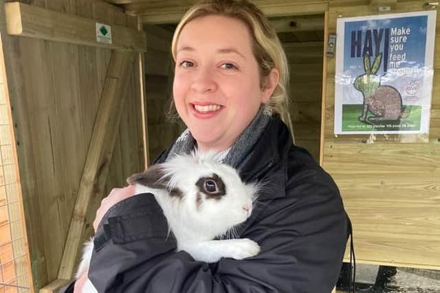 Wadars staff member Jenny Freeman with a rabbit in the charity's care.