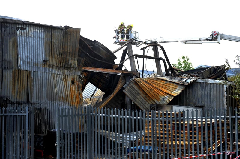 Firefighters are continuing to ‘dampen down remaining hotspots’ of a blaze at an industrial unit in Burgess Hill, West Sussex Fire & Rescue Service have reported.