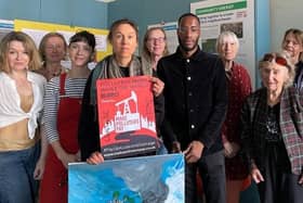 Lewes Climate Hub supporters call on leaders to demand fossil fuel companies compensate for climate change damage.