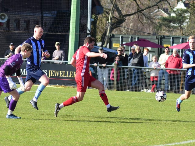 Josh Mundy scores the first Hassocks goal v Crowborough - Picture: Phil Dennett