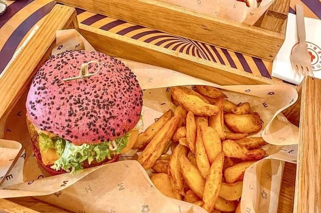 A Flower Burger Rainbow burger with savoury potatoes