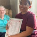 Homemaker Sreedhar Babu shares her poem with resident Betty.