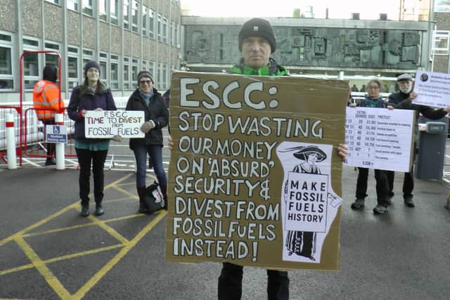 ESCC spent over £1,680 protecting County Hall from this protest about the "absurd" security spending, on 12 December 2023. Photo: Divest East Sussex