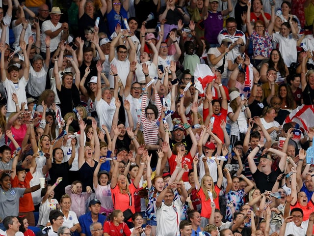 England fans celebrate after their side's seventh goal.
