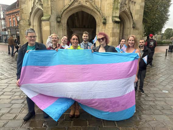 Melissa and other members of the trans community marched through Chichester city centre bearing flags and banners.