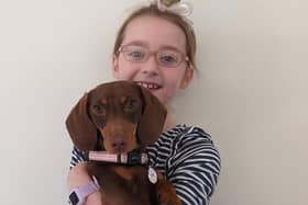 Horsham schoolgirl Rosie Parsons wrote to the Queen and told her about her pet dachsund Ted