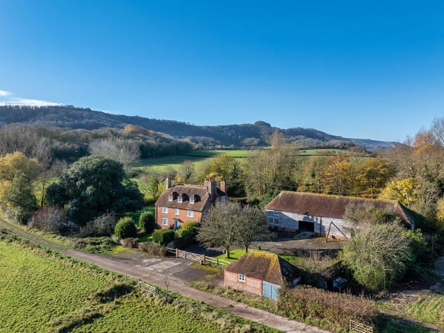 The property offers outbuildings, stabling and contemporary farm buildings