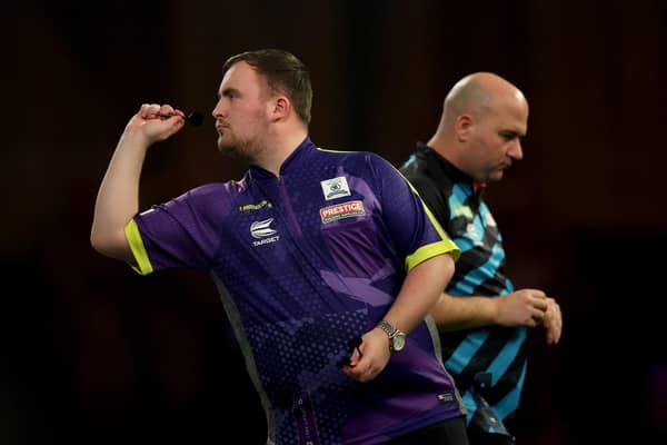 Luke Littler throws during his semi final against Rob Cross at the 2023/24 Paddy Power World Darts Championship at Alexandra Palace (Photo by Tom Dulat/Getty Images)