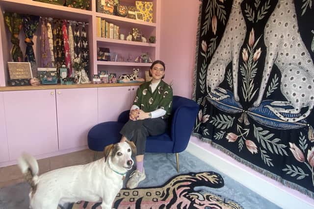 Catherine Rowe at her new unit in Draper's Yard, joined by Millie the dog.