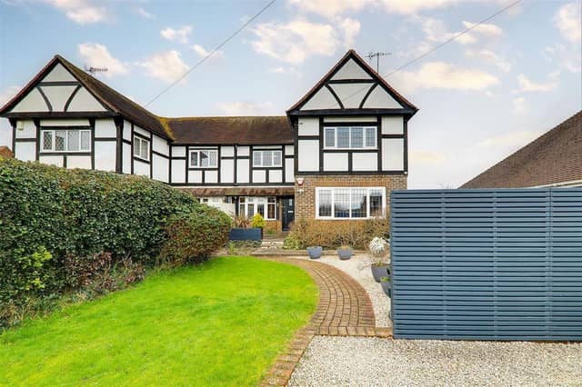 This impressive three-bedroom house close to the beach in Goring has a feature family room with part-vaulted ceiling