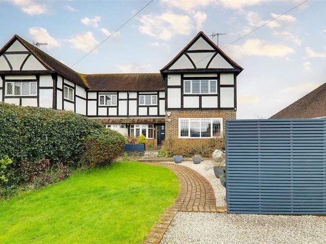 This impressive three-bedroom house close to the beach in Goring has a feature family room with part-vaulted ceiling