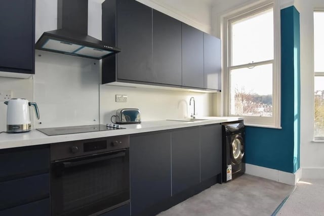 The flat has a modern fitted kitchen