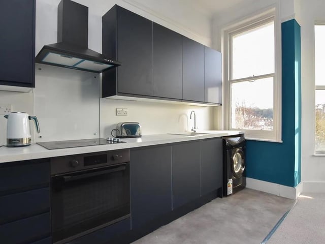 The flat has a modern fitted kitchen