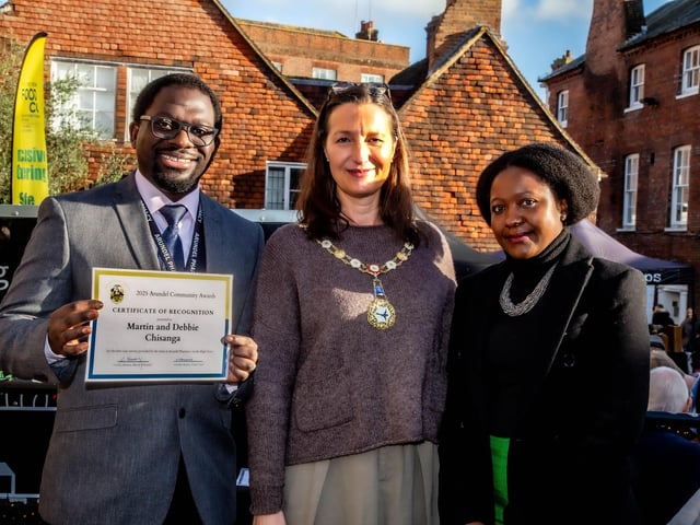 Martin and Debbie Chisanga from Arundel Pharmacy received a community recognition certificate