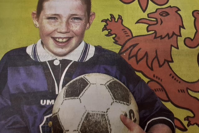 KInghorn girl, Chloe Melville (9) was chosen to lead the Scottish national football team on the the pitch at Hampden  ahead of their game against Austria.
She won the prize in  a competition run by the SFA's Travel Club.