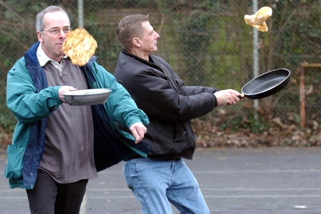 The fathers' pancake race at Midhurst Nursery Class in February 2008