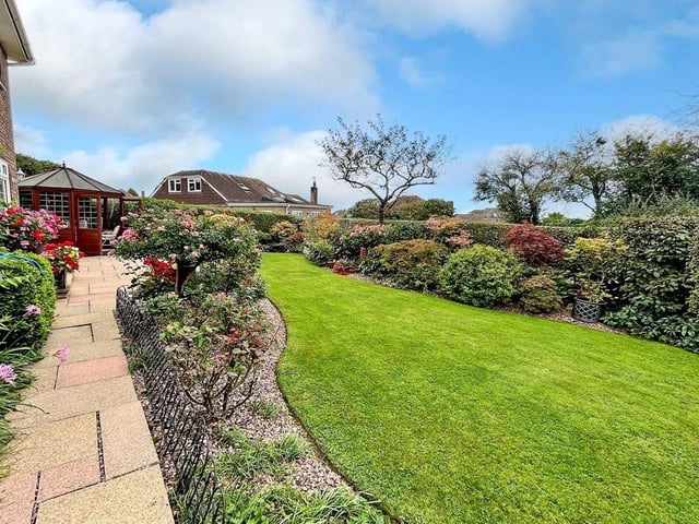 This three-bedroom, detached house with a stunning south-facing garden has come on the market with Graham Butt priced at £695,000