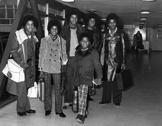 Michael Jackson and his brothers, Jackie, Tito, Marlon and Jermaine - the Jackson Five, at Heathrow Airport.   (Photo by George Stroud/Getty Images)
