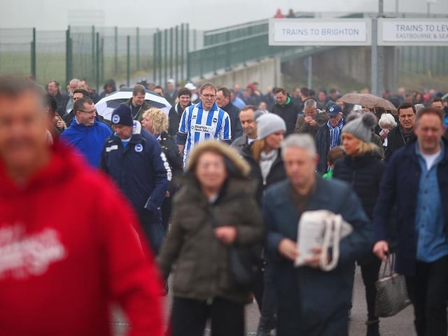 Fans make their way to the stadium prior to the Sky Bet Championship match between Brighton & Hove Albion and Norwich City at Amex Stadium on April 3, 2015.