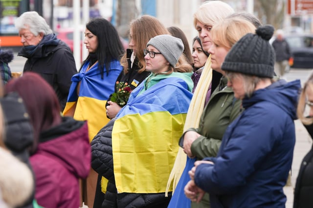 Dozens gathered outside Worthing Town Hall at 11am for a minute’s silence and prayer to mark one year since the Russian invasion of Ukraine began.