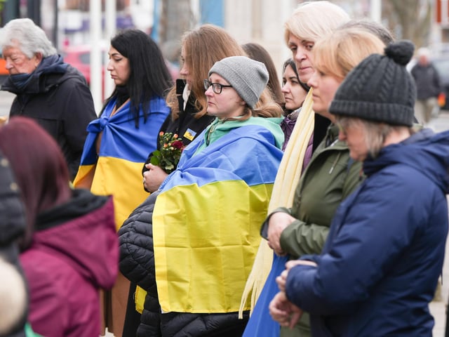 Dozens gathered outside Worthing Town Hall at 11am for a minute’s silence and prayer to mark one year since the Russian invasion of Ukraine began.